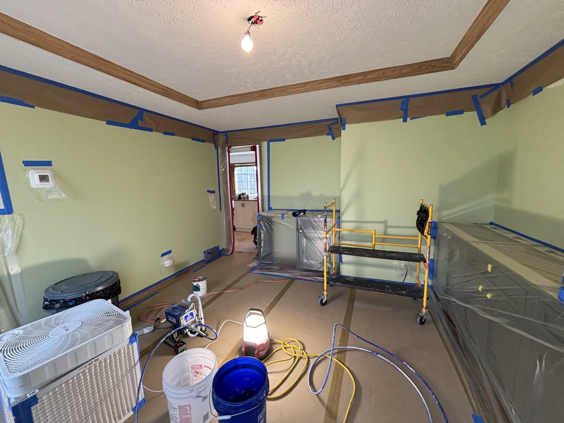 Room prepped and taped for painting